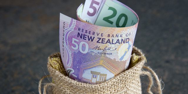 New Zealand dollar rallies on less-dovish RBNZ